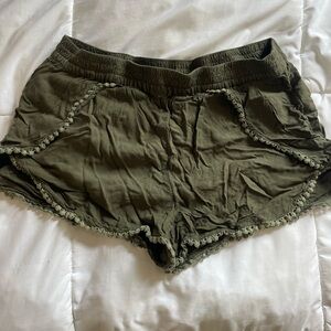 Green flowy shorts.